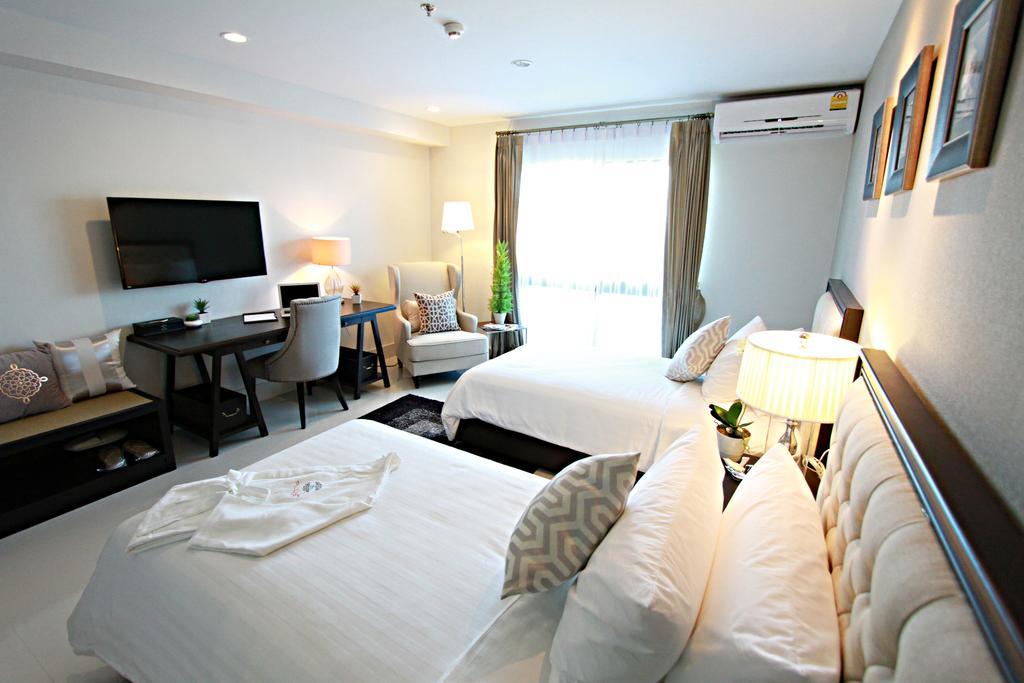 SN Plus Hotel - SHA Plus Pattaya Zimmer foto